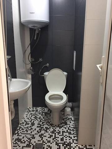 Фото номера Стандартный трехместный номер Гостевой дом Къща за гости ЕЛИ г. Приморско 6
