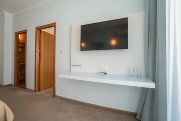 Фото номера Семейный номер Отель Hotel Perla Beach I г. Приморско 12