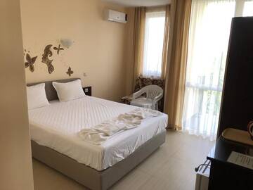 Фото номера Двухместный номер с 1 кроватью, вид на сад Гостевой дом Guest House Ivano г. Приморско 15