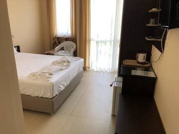 Фото номера Двухместный номер с 1 кроватью, вид на сад Гостевой дом Guest House Ivano г. Приморско 12