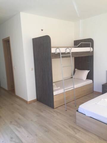 Фото номера Семейный номер-студио с двухъярусной кроватью Гостевой дом Guest House ASK г. Приморско 6